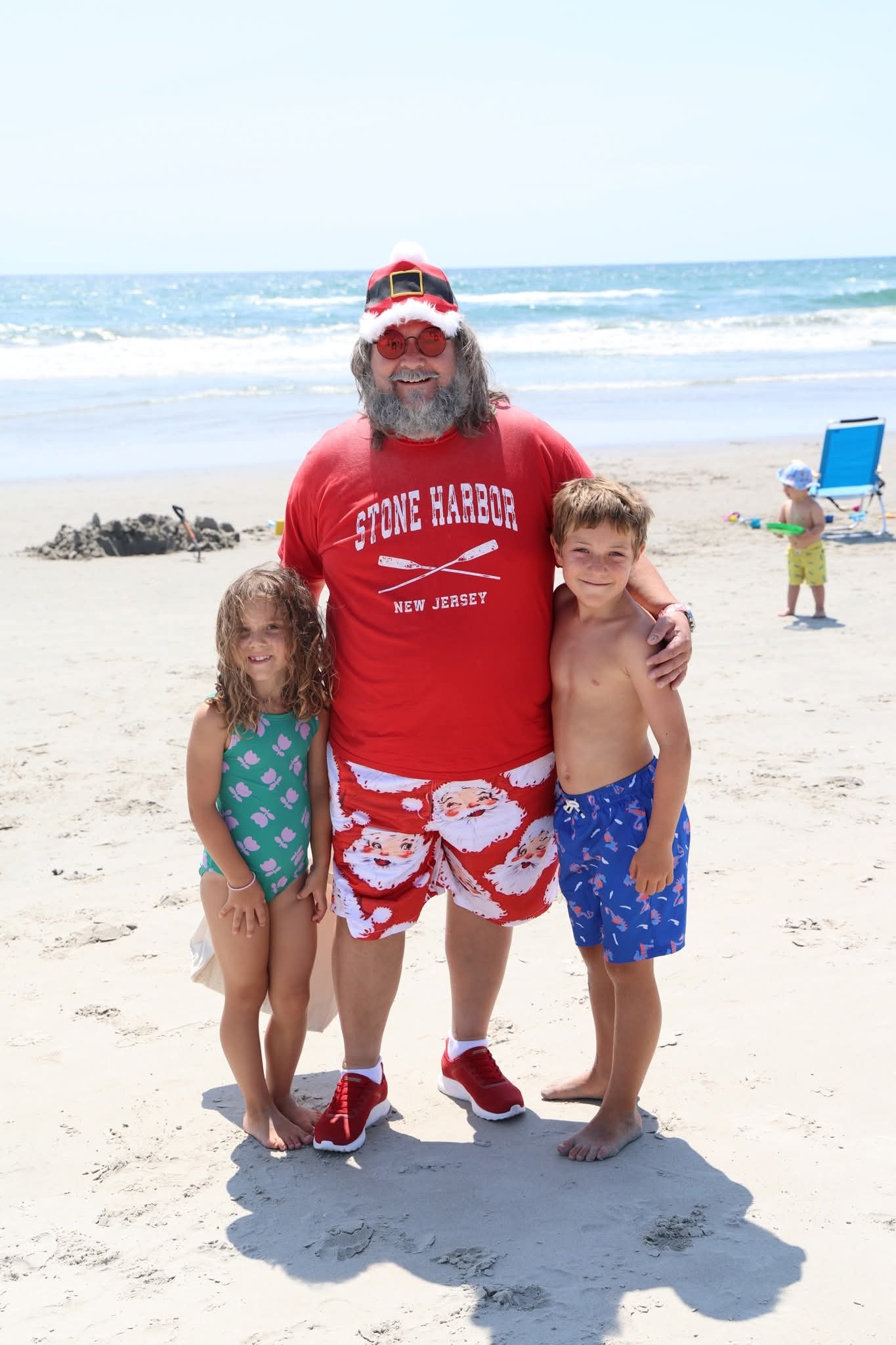 Cape May County Santa with a girl and boy on the Stone Harbor beach
