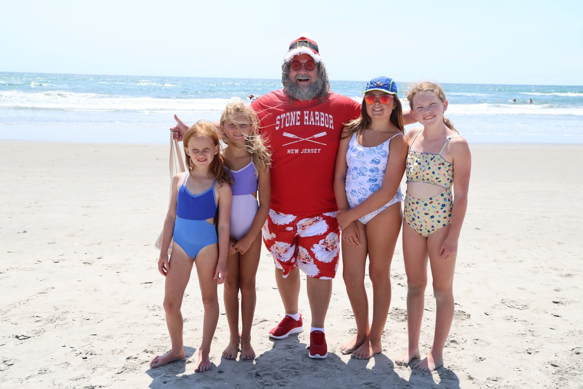 Cape May County Santa with four girls on the Stone Harbor beach