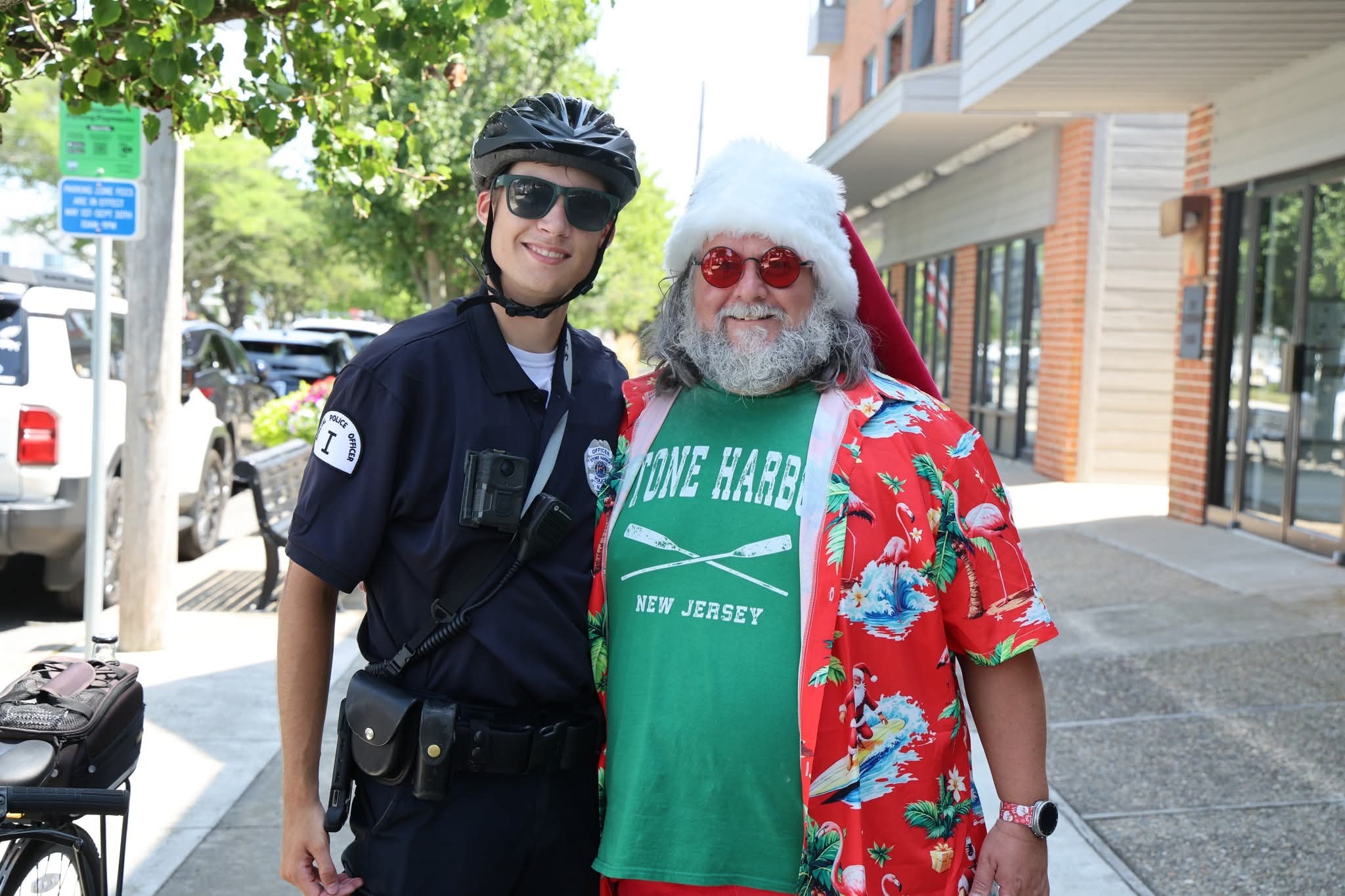 Cape May County Santa with a Stone Harbor police bicycle officer on the street